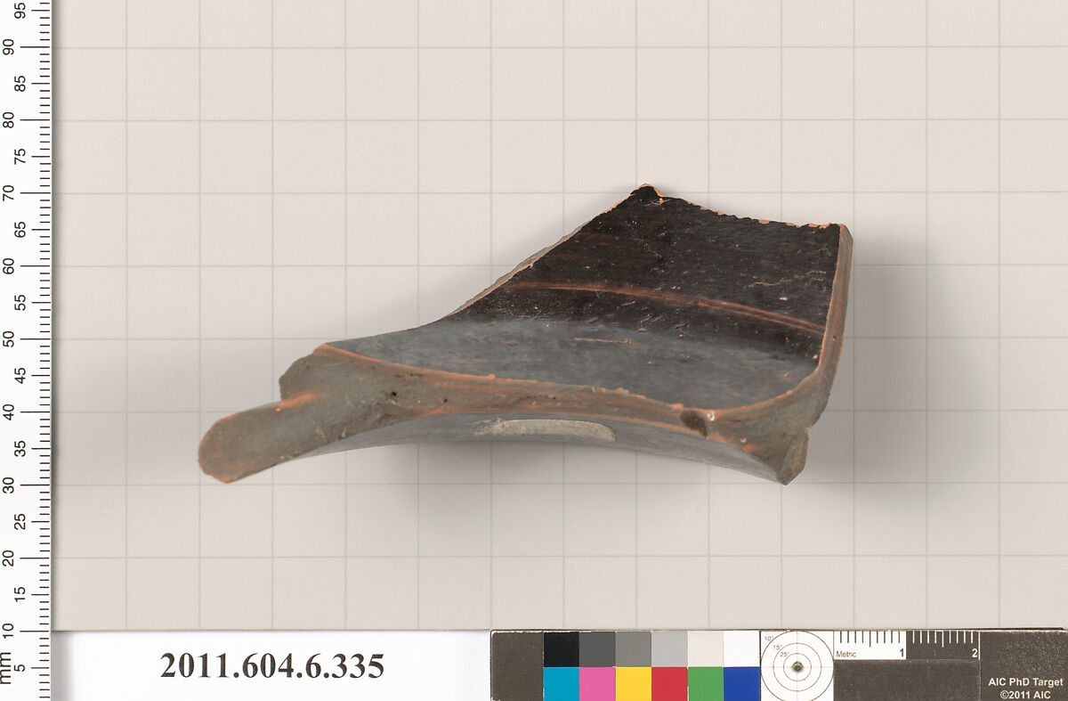 Terracotta fragment of a skyphos (deep drinking cup), Terracotta, Greek, Attic