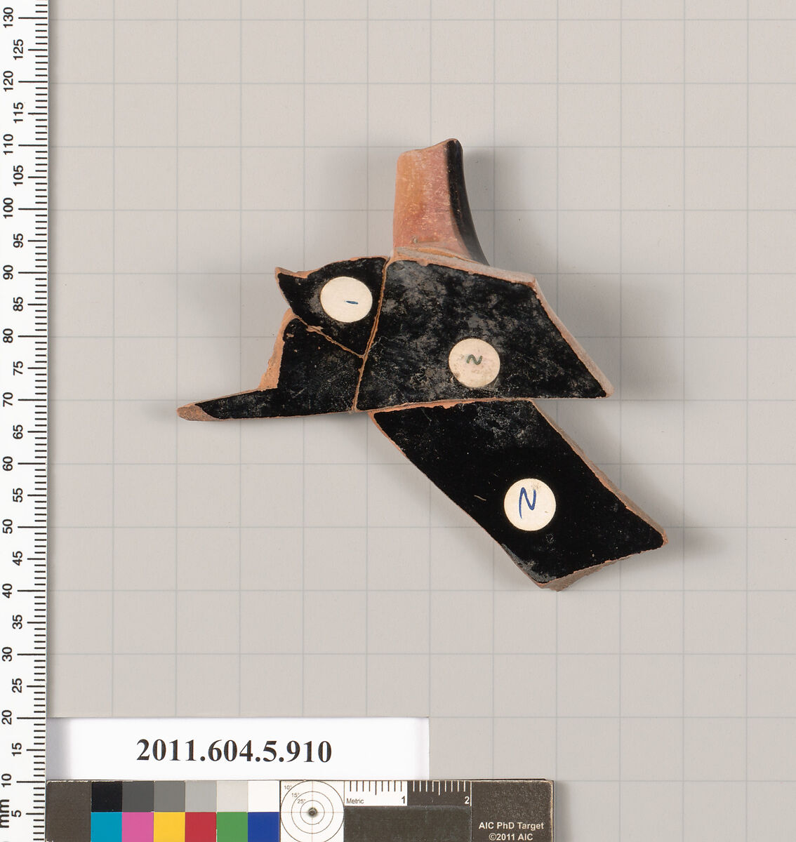 Terracotta fragment of a kylix (drinking cup), Terracotta, Greek, Attic