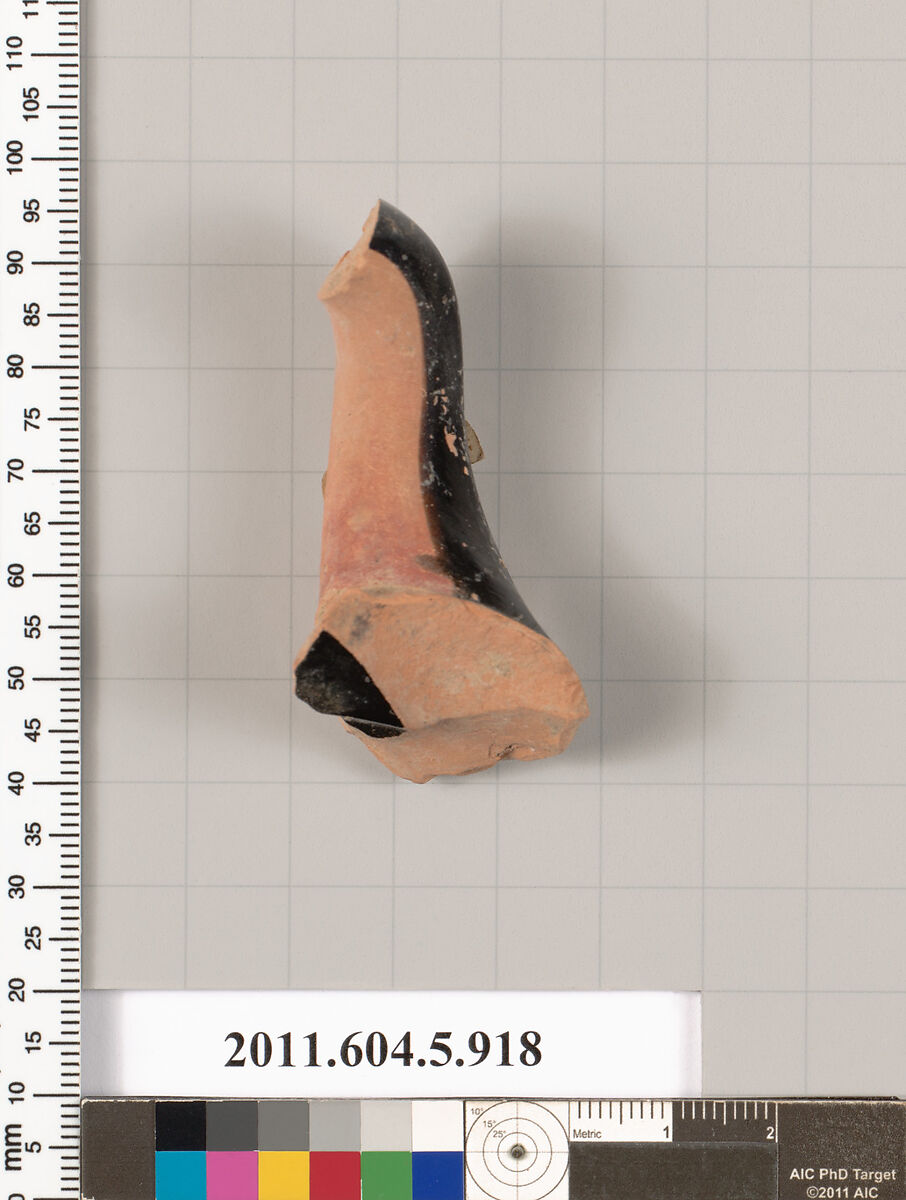 Terracotta fragment of a kylix (drinking cup), Terracotta, Greek, Attic