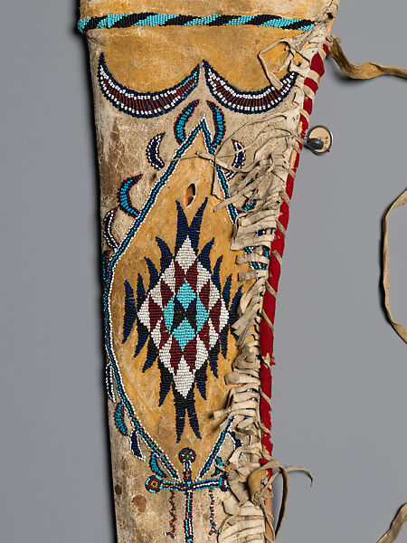 Quiver and arrows, Quiver: tanned leather, glass beads, and pigment
arrows: cane, wood, pitch, stone, sinew, and feathers, Apache, Native American