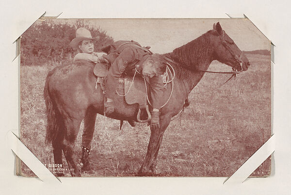 Hoot Gibson giving wounded officer a lift from Western Stars or Scenes Exhibit Cards series (W412), Exhibit Supply Company, Commercial color photolithograph 