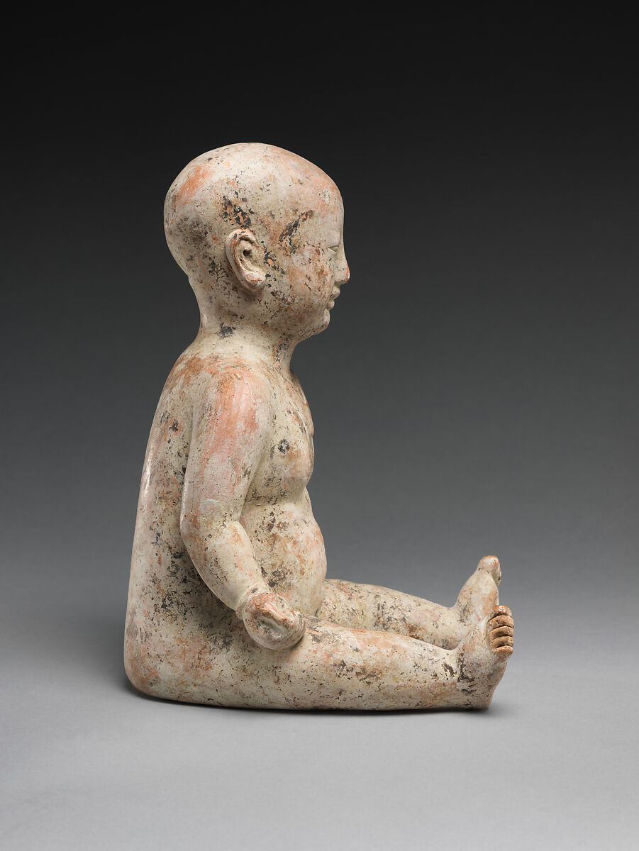 Sitting boy, Earthenware with slip, China