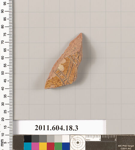 Fragment of a glazed ceramic plate
