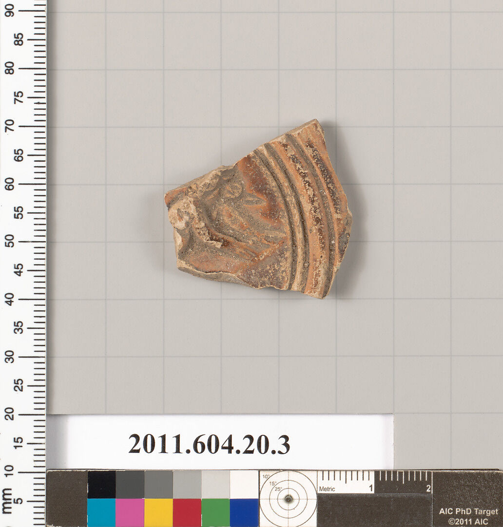 Fragment of a terracotta lamp, Terracotta, Roman 