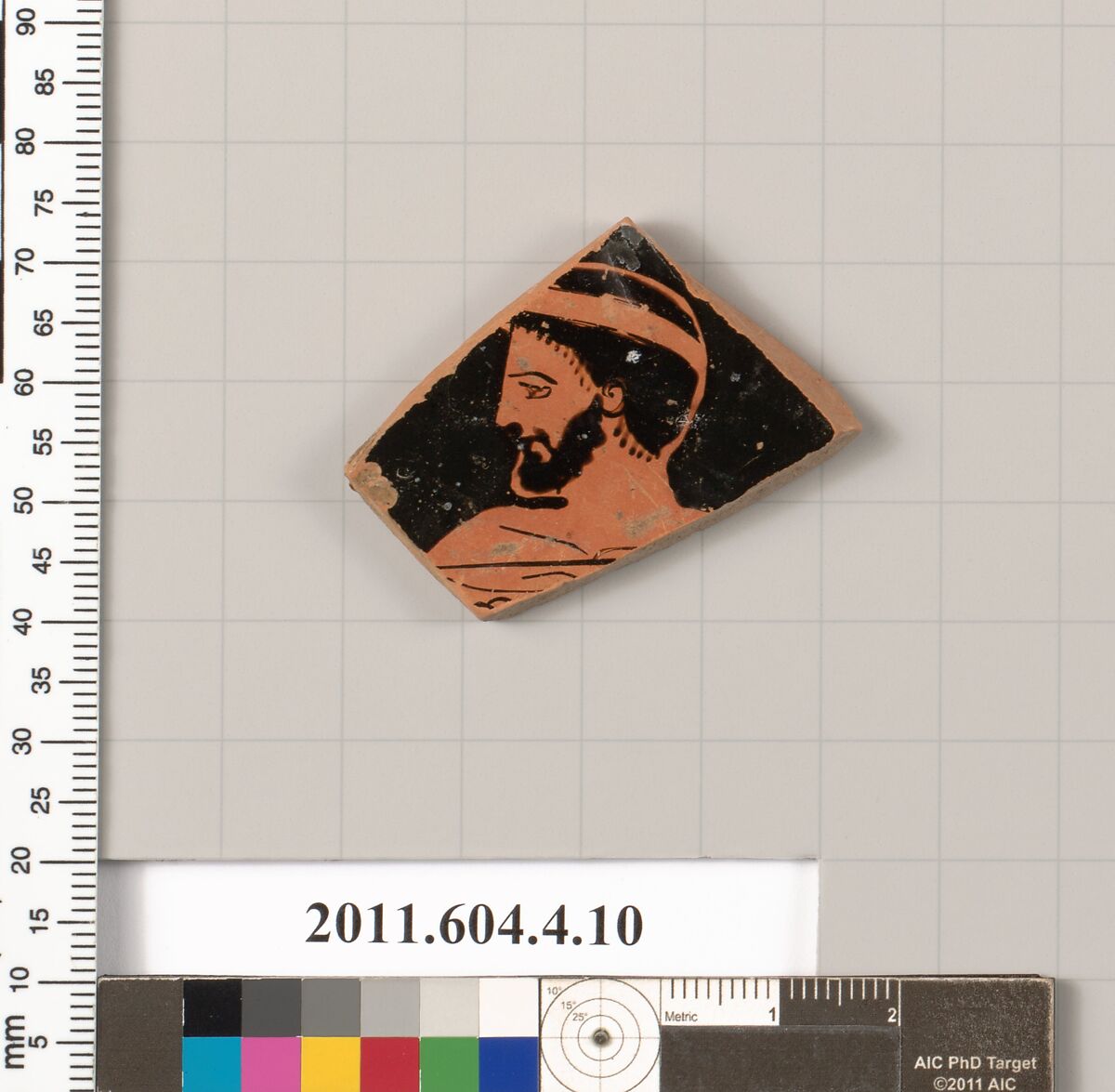 Terracotta fragment of a kylix (drinking cup), Terracotta, Greek, Attic 