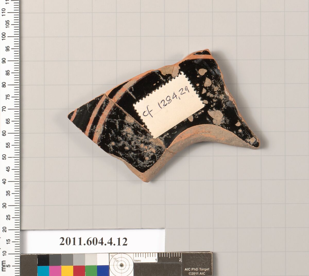 Terracotta fragment of a kylix (drinking cup), Terracotta, Greek, Attic