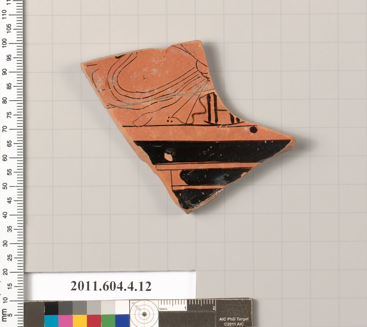 Terracotta fragment of a kylix (drinking cup), Terracotta, Greek, Attic 