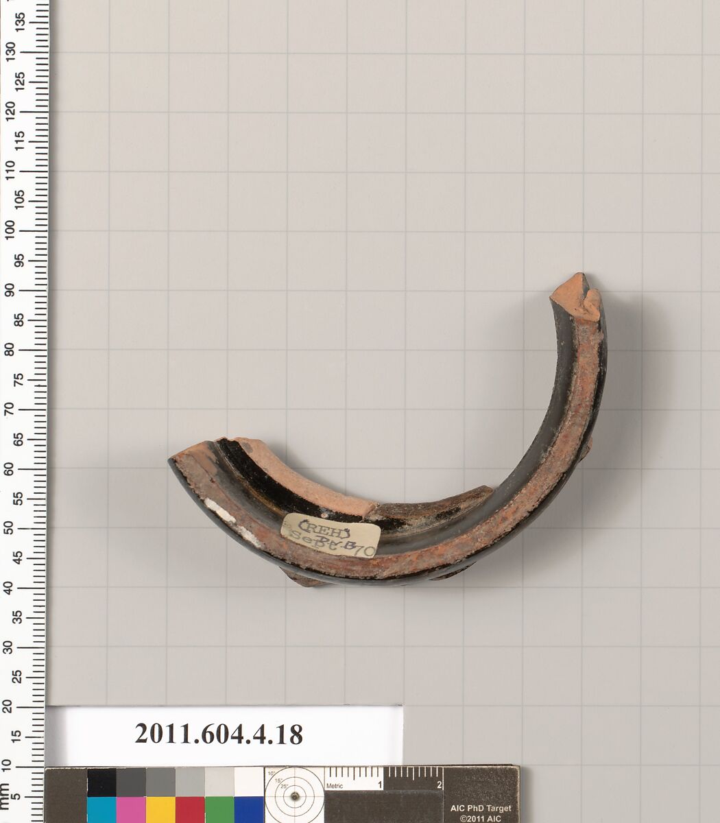 Terracotta fragment of a stemless kylix (drinking cup), Terracotta, Greek, Attic