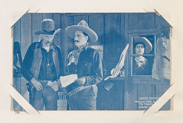 Jack Hoxie trails the gunmen to their den from Western Stars or Scenes Exhibit Cards series (W412), Commercial color photolithograph 