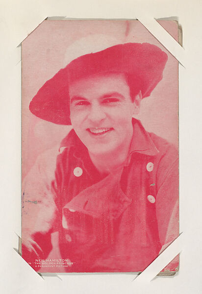 Neil Hamilton in "The Golden Princess" from Western Stars or Scenes Exhibit Cards series (W412), Commercial color photolithograph 