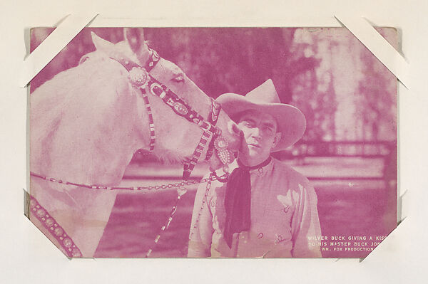 Wilver Buck giving a kiss to his master Buck Jones from Western Stars or Scenes Exhibit Cards series (W412), Commercial color photolithograph 
