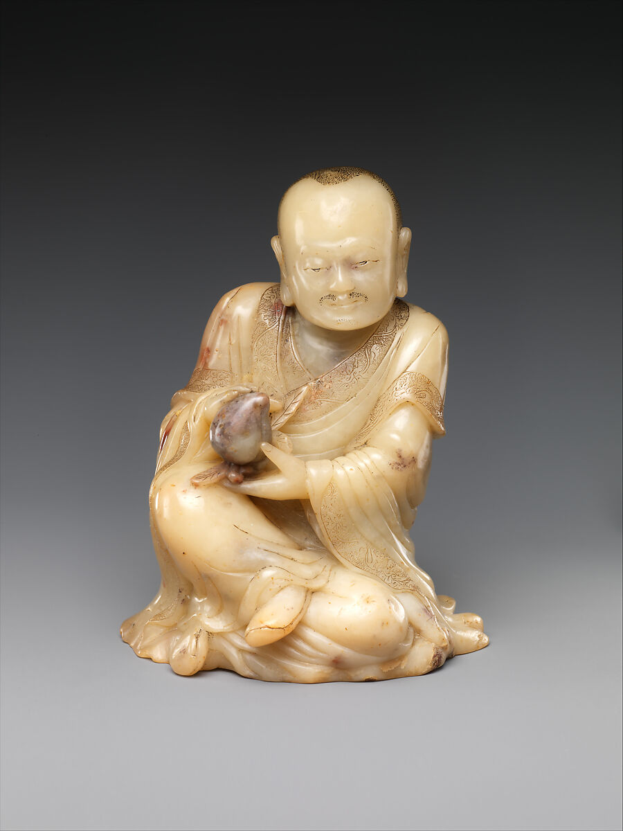 Buddhist disciple, or luohan, holding a peach, Soapstone, China 