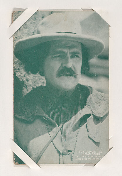 Guy Oliver, the Indian Scout in "The Pony Express" from Western Stars or Scenes Exhibit Cards series (W412), Commercial color photolithograph 