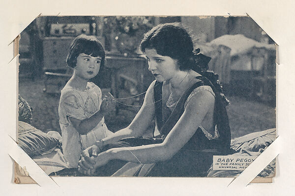 Baby Peggy in "The Family Secret" from Scenes from Movies Exhibit Cards series (W404), Commercial color photolithograph 