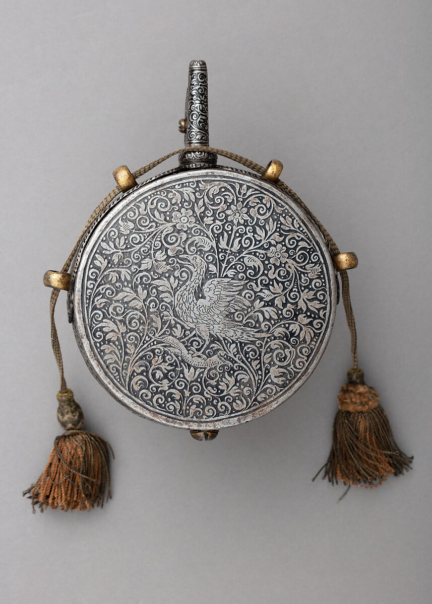 Priming Flask Bearing the Monograms and Arms of the Prince-Elector August I of Saxony (reigned 1553–86) and  Anna of Denmark (reigned 1553–85), Master Thomas der Schwertfeger (possibly Thomas Rucker) (German, active Augsburg, Vienna, and Dreseden, 1535–1606), Iron, gold, silver, silk, German, probably Saxony
