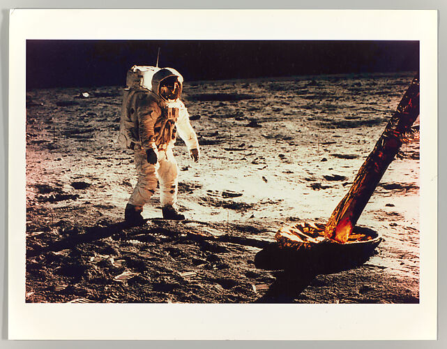 Buzz Aldrin Walking on the Surface of the Moon Near a Leg of the Lunar Module
