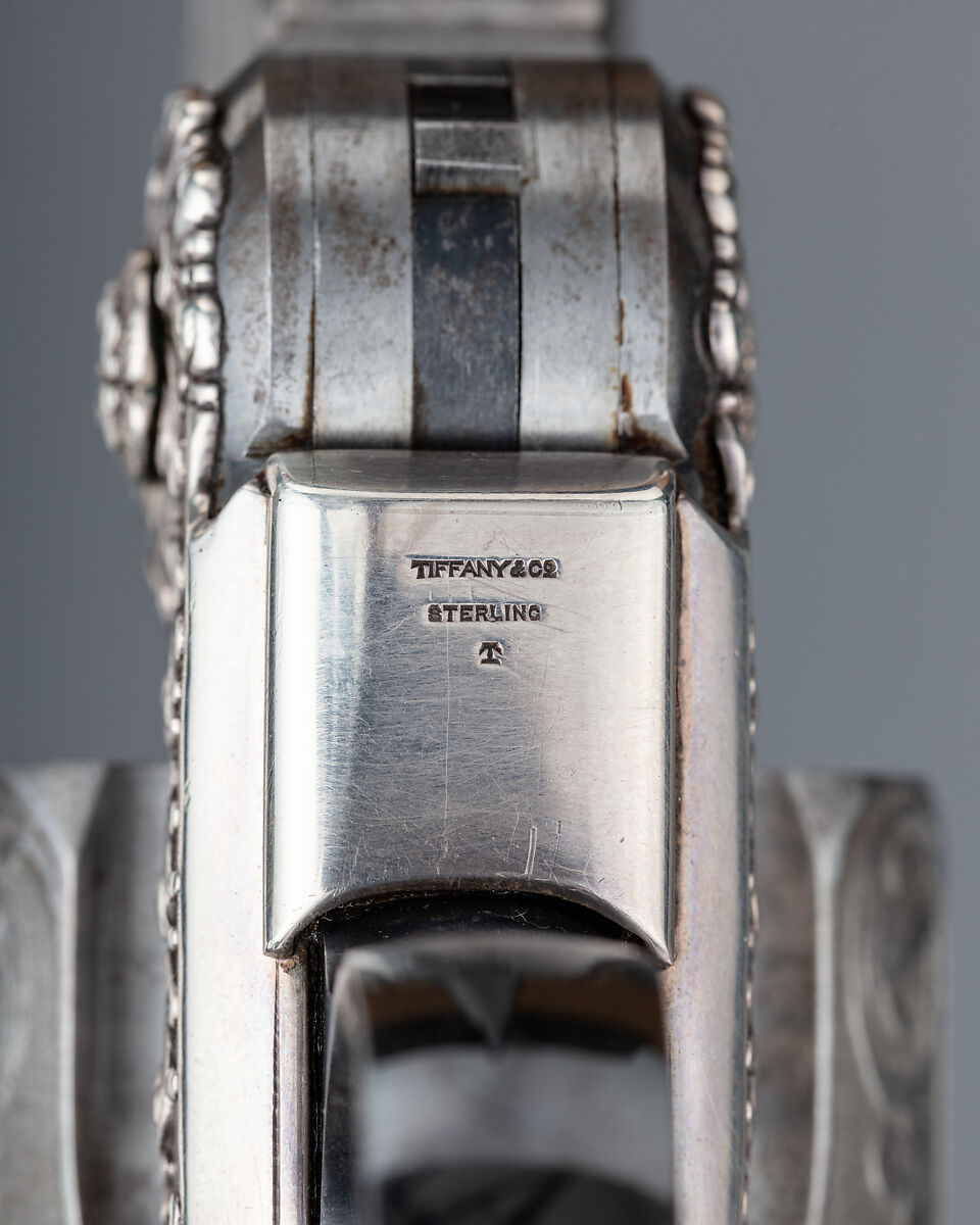 Smith & Wesson .44 Double-Action Frontier Model Revolver decorated by Tiffany & Co. (serial no. 8401), with Case and Cleaning Rod, Smith &amp; Wesson (American, established 1852), Steel, silver, ivory, textile (chamois), wood (California laurel), American, Springfield, Massachusetts and New York