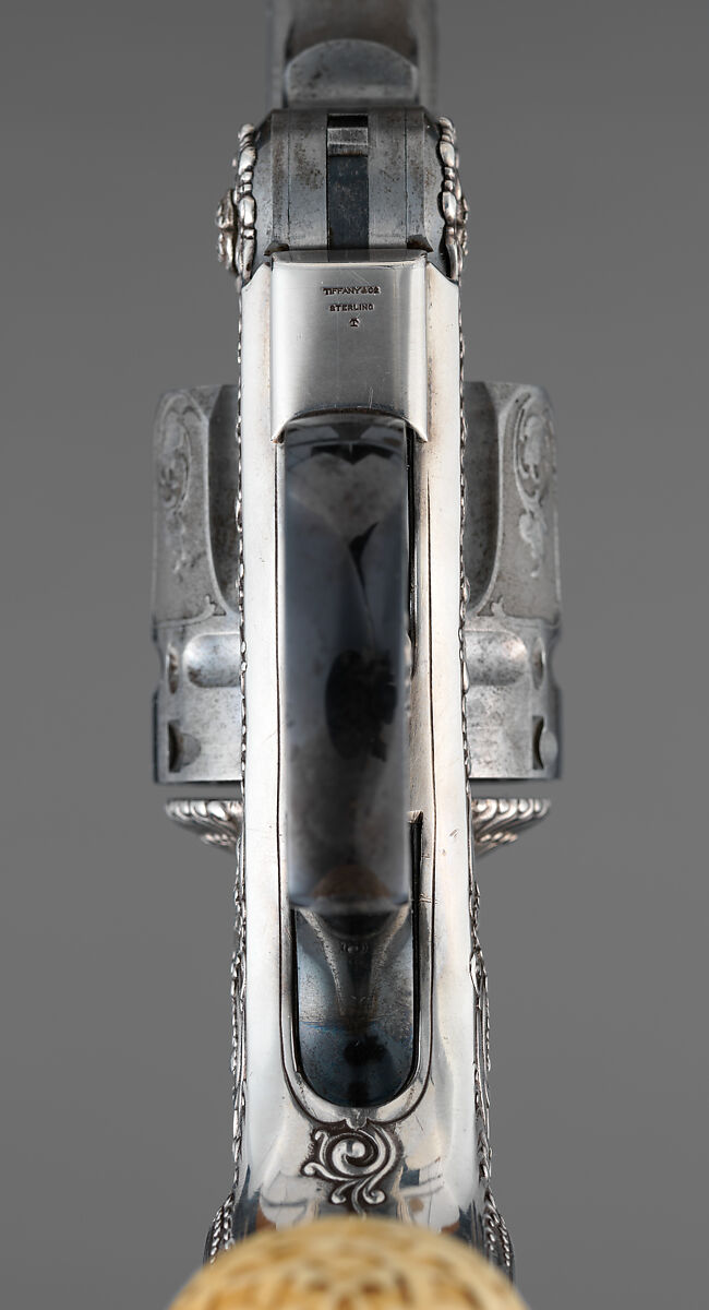 Smith & Wesson .44 Double-Action Frontier Model Revolver decorated by Tiffany & Co. (serial no. 8401), with Case and Cleaning Rod, Smith &amp; Wesson (American, established 1852), Steel, silver, ivory, textile (chamois), wood (California laurel), American, Springfield, Massachusetts and New York