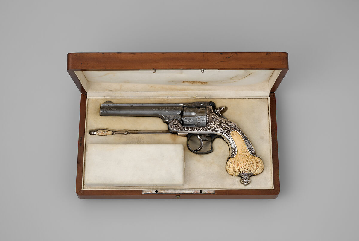 Smith & Wesson .44 Double-Action Frontier Model Revolver decorated by Tiffany & Co. (serial no. 8401), with Case and Cleaning Rod, Smith &amp; Wesson (American, established 1852), Steel, silver, ivory, textile (chamois), wood (California laurel), American, Springfield, Massachusetts and New York