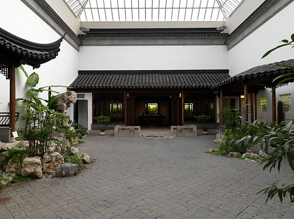 The Astor Chinese Garden Court, Taihu rocks, granite terrace, ceramic tile flooring, roof tiles, and door frames,  various woods (nan wood columns, pine beams, gingko latticework), brass fittings, China
