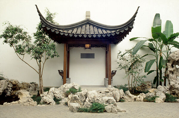 The Astor Chinese Garden Court, Taihu rocks, granite terrace, ceramic tile flooring, roof tiles, and door frames,  various woods (nan wood columns, pine beams, gingko latticework), brass fittings, China