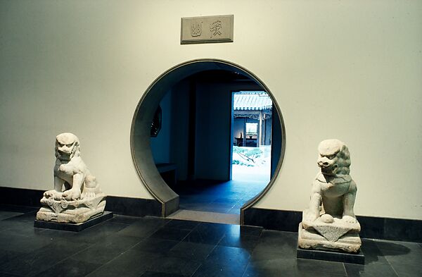 The Astor Chinese Garden Court, Taihu rocks, granite terrace, ceramic tile flooring, roof tiles, and door frames,  various woods (nan wood columns, pine beams, gingko latticework), brass fittings, China