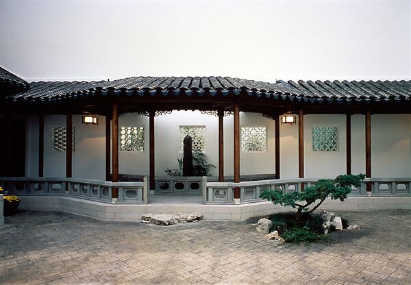 The Astor Chinese Garden Court, Taihu rocks, granite terrace, ceramic tile flooring, roof tiles, and door frames,  various woods (nan wood columns, pine beams, gingko latticework), brass fittings, China
