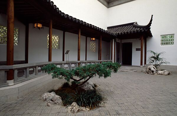 The Astor Chinese Garden Court, Taihu rocks, granite terrace, ceramic tile flooring, roof tiles, and door frames,  various woods (nan wood columns, pine beams, gingko latticework), brass fittings, China