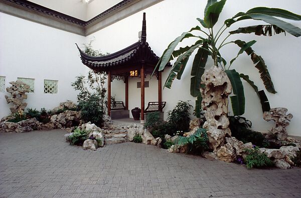 The Astor Chinese Garden Court, Taihu rocks, granite terrace, ceramic tile flooring, roof tiles, and door frames,  various woods (nan wood columns, pine beams, gingko latticework), brass fittings, China