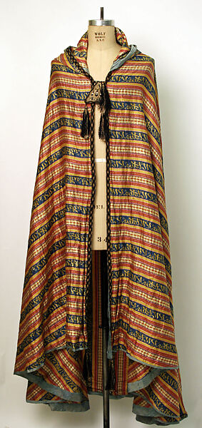 Woman's Cape, Silk, cotton, wool, metal wrapped thread, metal, and paper; satin weave; plain weave; braided; felt