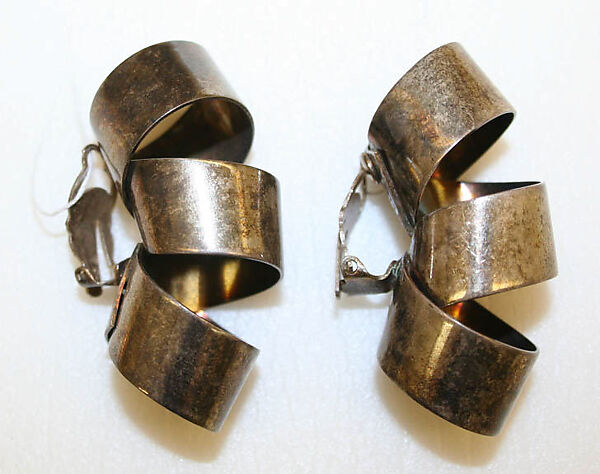 Earrings, metal, American or European 