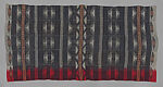 Elégẹ̀gẹ̀ pupa (woman’s prestige wrapper with red band)