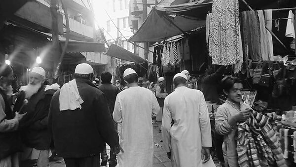 When All Roads Are One, Ghiora Aharoni (American, born Rehovot, Israel 1969), Single-channel digital video, black-and-white, 7 min., 46 sec.; gilded taxi meter, pedestal and vitrine