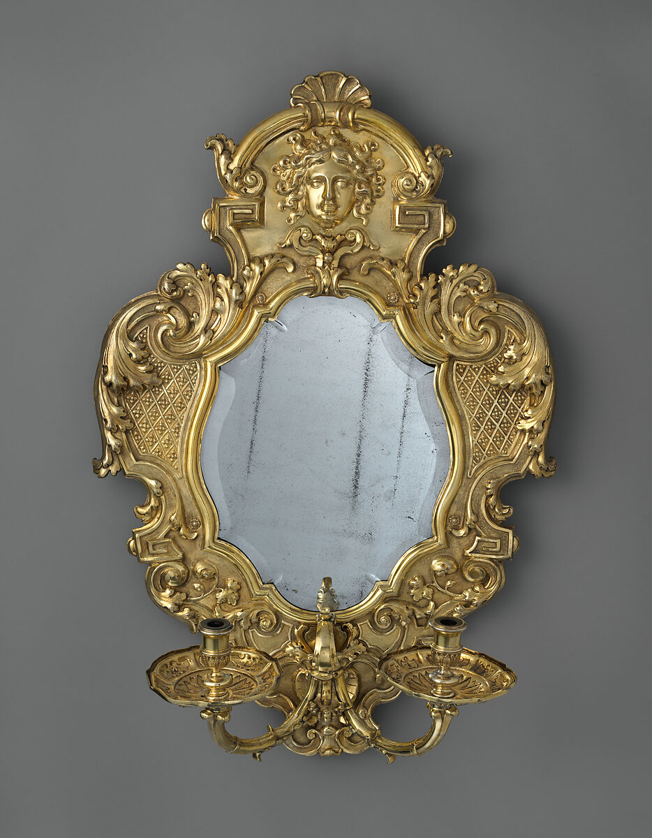 Monumental mirror sconce (one of a pair), Peter Rahm (German, 1661–1737), Silver, embossed, chiseled, engraved and gilded; mirror glass (19th century replacement); wood frame, German, Augsburg 