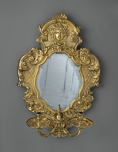 Monumental mirror sconce (one of a pair)
