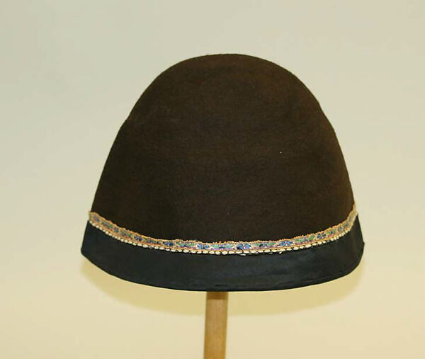 Ensemble, (a) wool
(b, c) cotton, wool, leather
(d) wool, silk
(e) linen, Tibet