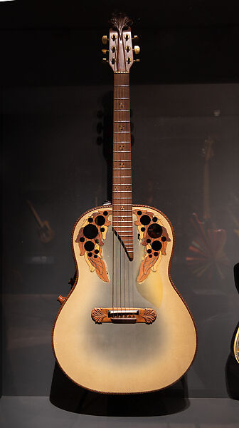 Adamas 1687-7 (serial no. 477-92), Ovation Guitars, Carbon fiber, fiberglass, birch, black walnut, rosewood, teak, maple, padauk, amaranth, aluminum, steel, plastic 