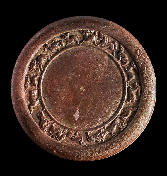 Stone disc with frieze of animals, Steatite, Northern India 