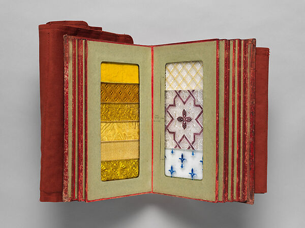 Album des principaux modeles de verres : produits spéciaux en verre coulé, Manufactures des glaces &amp; produits chimiques de Saint-Gobain, Chauny &amp; Cirey, Cloth cover binding. Twelve double boards cloth hinged with embedded glass samples