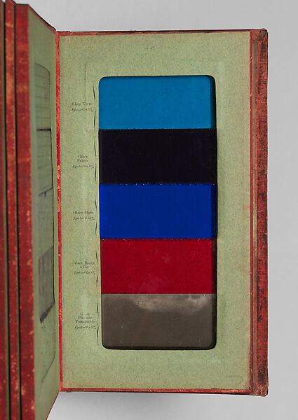 Album des principaux modeles de verres : produits spéciaux en verre coulé, Manufactures des glaces &amp; produits chimiques de Saint-Gobain, Chauny &amp; Cirey, Cloth cover binding. Twelve double boards cloth hinged with embedded glass samples