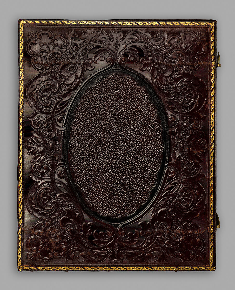 [Man Gripping Sledgehammer, Wearing Leather Half Apron and Cap], Unknown, Ambrotype with applied color