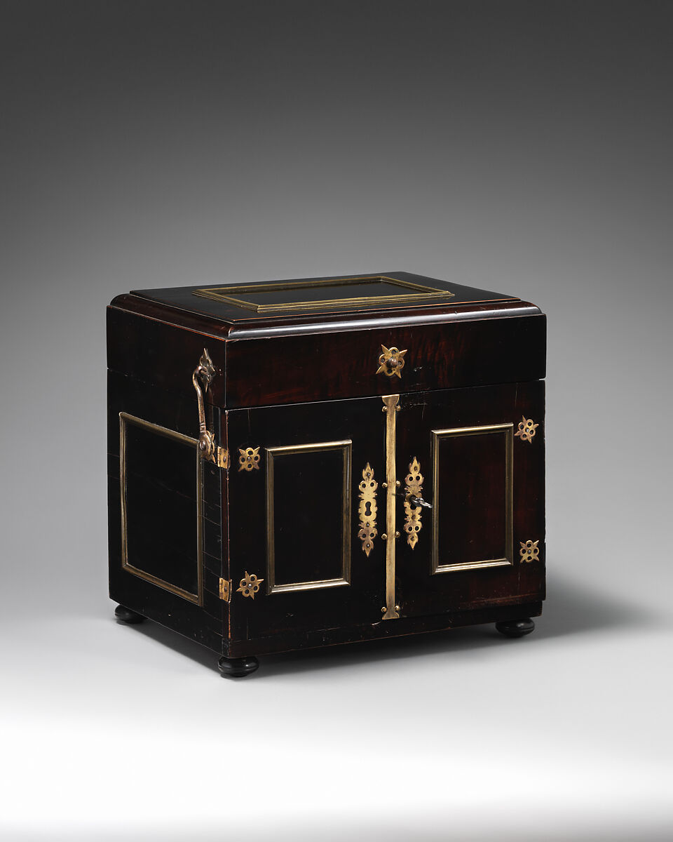 Apothecary Cabinet, Nicolaus I Kolb (German, master 1582–1621), Veneer: ebonized pearwood (Pyrus communis), ebony, partially gilded silver; carcass: conifer; interior: protective quilted cushion covered in red silk, drawers and chest lined with red silk velvet; gold trimming; mounts and fittings: partially gilded brass; thirty-two (32) vessels and utensils: glass, partially gilded silver, low carbon steel, leather, German, Augsburg