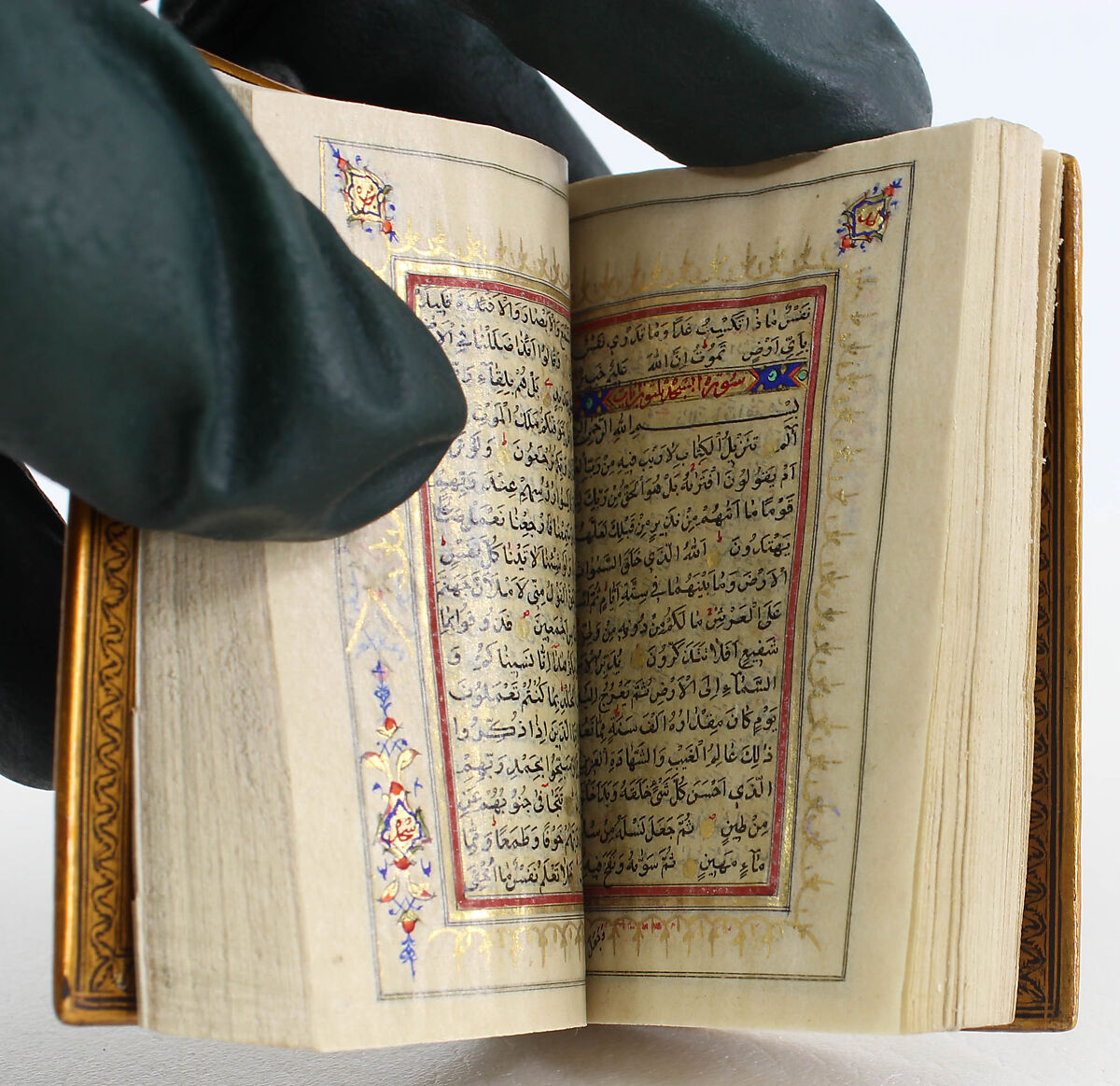 Miniature Qur'an with Lacquered Binding and Carrying Case, Ink, gold, silver, and opaque watercolor on parchment and paper