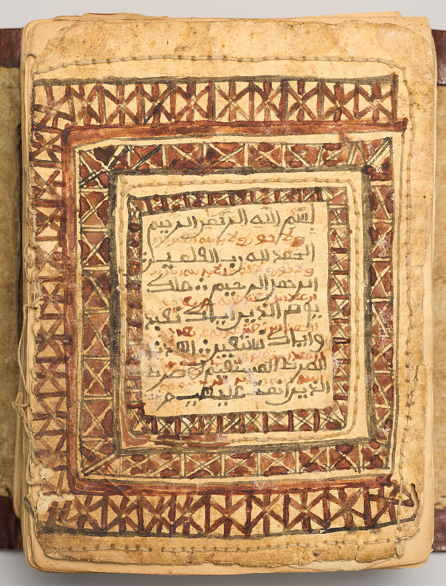 Qur'an, Ink and opaque watercolor on paper; embossed leather cover