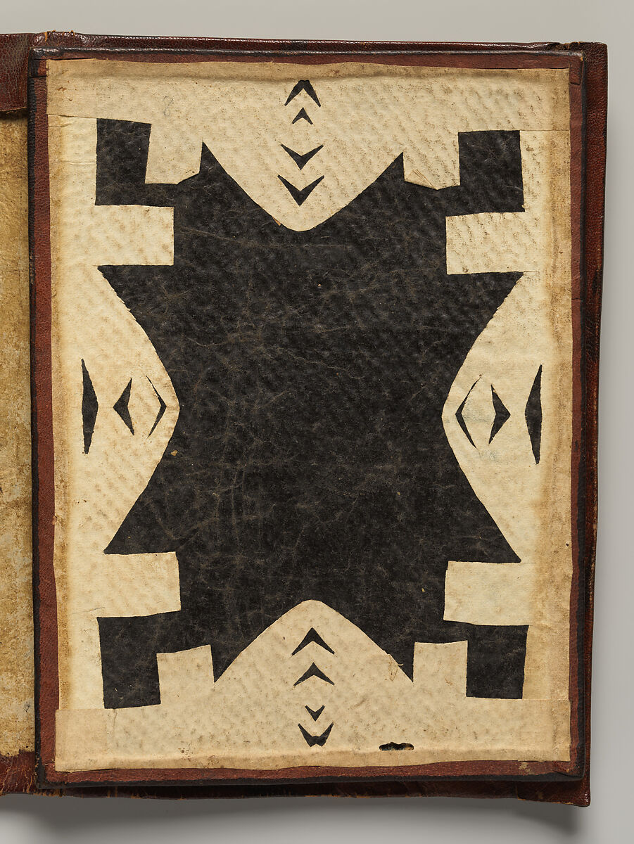 Qur'an, Ink and opaque watercolor on paper; embossed leather cover