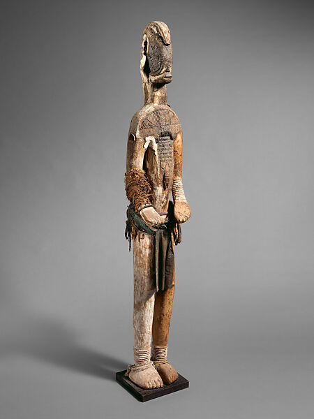 Male Figure, "Master of the Narrow Face" (active late 19th–early 20th century, Onitsha-Awka region, Nigeria), Wood, cotton cloth, pigment, plant fiber, metal, Igbo peoples