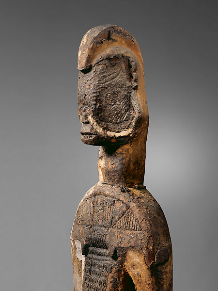 Male Figure, "Master of the Narrow Face" (active late 19th–early 20th century, Onitsha-Awka region, Nigeria), Wood, cotton cloth, pigment, plant fiber, metal, Igbo peoples