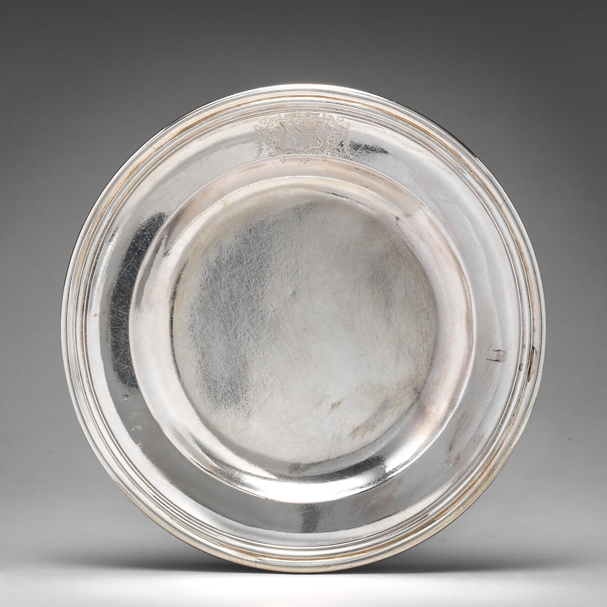 Dinner plate with English arms (one of a group of four), Richard Bayley (British, active 1708–48), Silver, British, London 