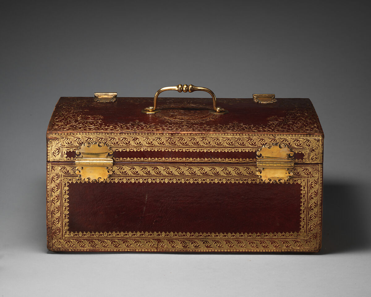 Coffer stamped with the arms of Marie Thérèse of Savoy as the Countess of Artois, attributed to les frères Riollant (French), Wood, red morocco gilt-tooled leather, brass metal handle and clasps; silk lining, French