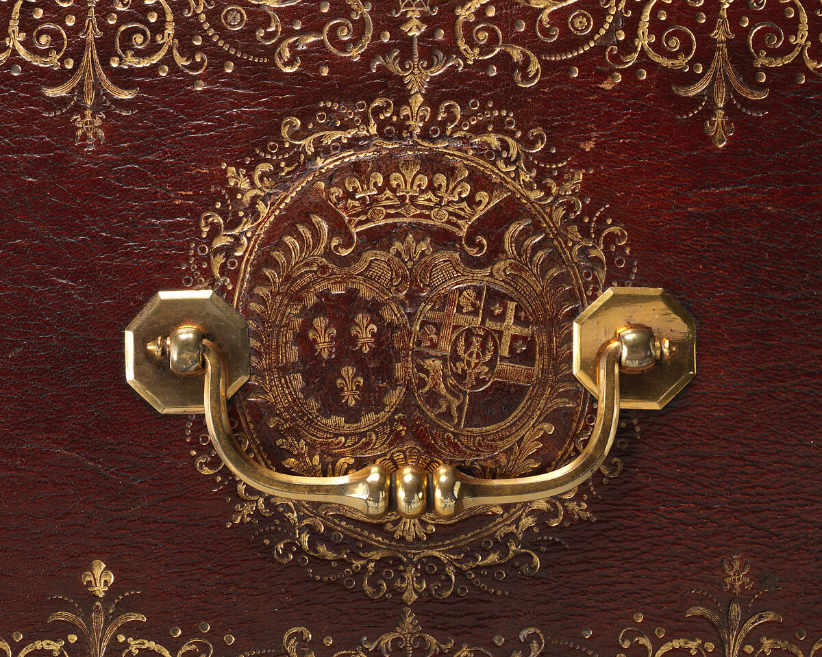 Coffer stamped with the arms of Marie Thérèse of Savoy as the Countess of Artois, attributed to les frères Riollant (French), Wood, red morocco gilt-tooled leather, brass metal handle and clasps; silk lining, French